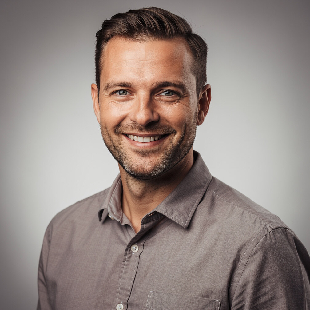 Portrait of a male journalist smiling at camera